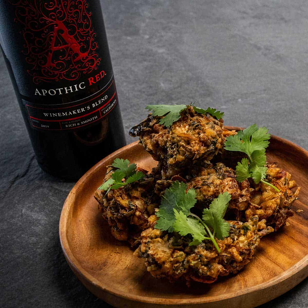 Pakoras plate with Apothic red bottle